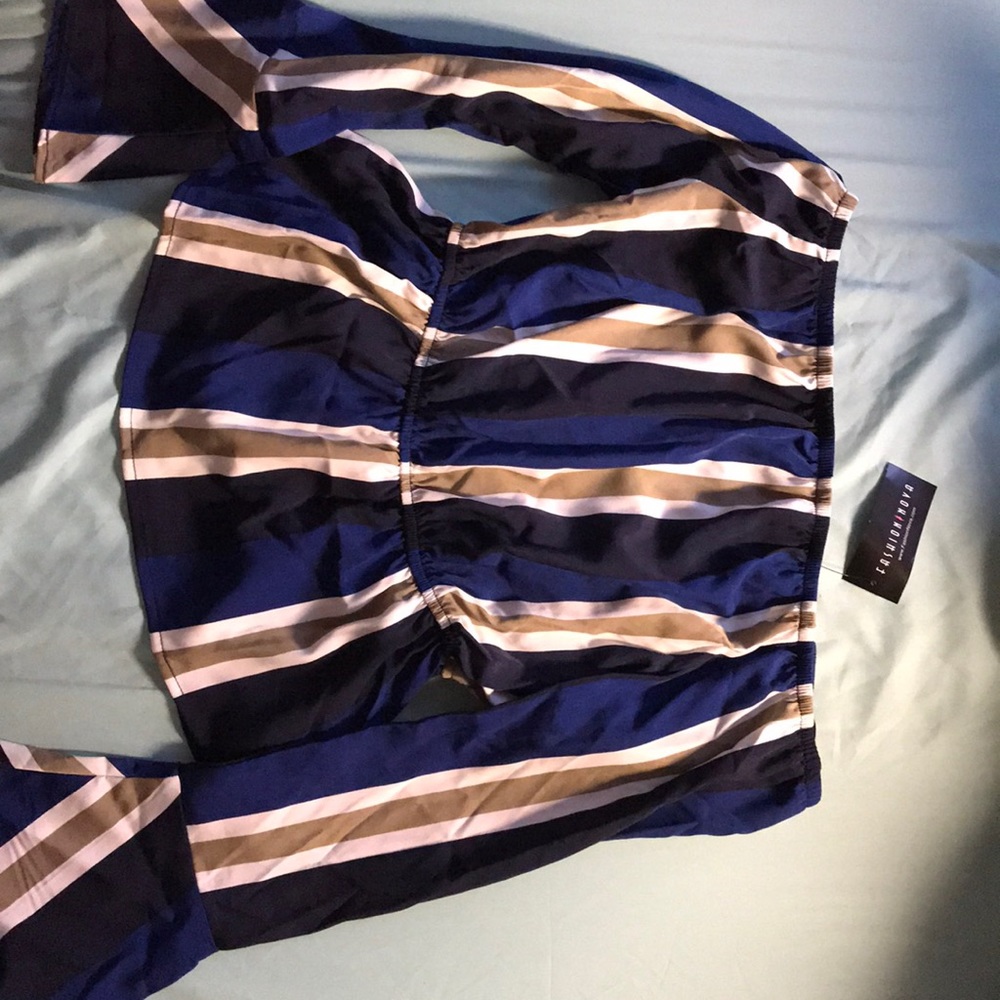 Lunch Date Peplum Top. Color: Navy/Multi. Size:XS
